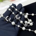 Chanel Pearl Necklace with Interlocking CC Logos Charms - Image 5