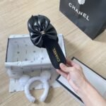 Chanel Bow Embellished Slides In Black - Image 4