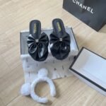 Chanel Bow Embellished Slides In Black - Image 2