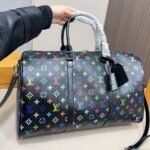 Perfect Match: Louis Vuitton TM Keepall Bandoulière Black 45cm X Louis Vuitton TM Cosmetic Pouch 19cm - Image 2