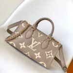 Louis Vuitton OnTheGo East West Bicolor Monogram Empreinte Cream 25cm M23641 - Image 2