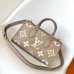 Louis Vuitton OnTheGo East West Bicolor Monogram Empreinte Cream 25cm M23641 - Image 8
